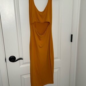 Short orange, tank top dress with open cut in front